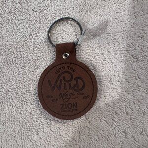 Brown Faux Leather Zion National Park Keychain With "Into The Wild We Go" Engrav